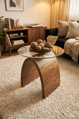 Designer wooden side table with glass top styled in modern interior